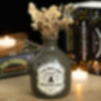 Ceramic potion bottle vase and candle holder with Mischief and Magic design