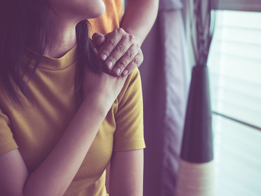 Woman being comforted by a friend learning self-compassion
