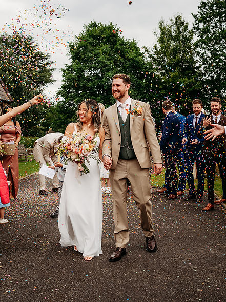 Oscar and Eva on their wedding day in Cheshire, photo credit to @thetaylorsfilmandphoto