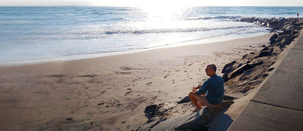 Tony Rubbo Meditating On Beach.jpg