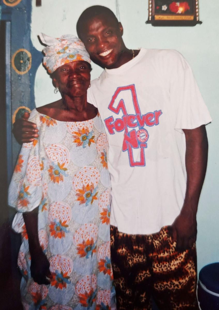 photo of our Co-founder and Artistic Director,Alseny Yansane, and his mother, N'Gawa