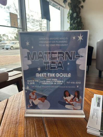 A sign is displayed for a pregnancy event in hampton roads virginia