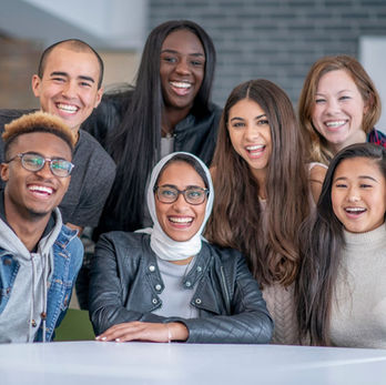 Mentor guiding a newcomer in a supportive environment at Vision Learning Centre