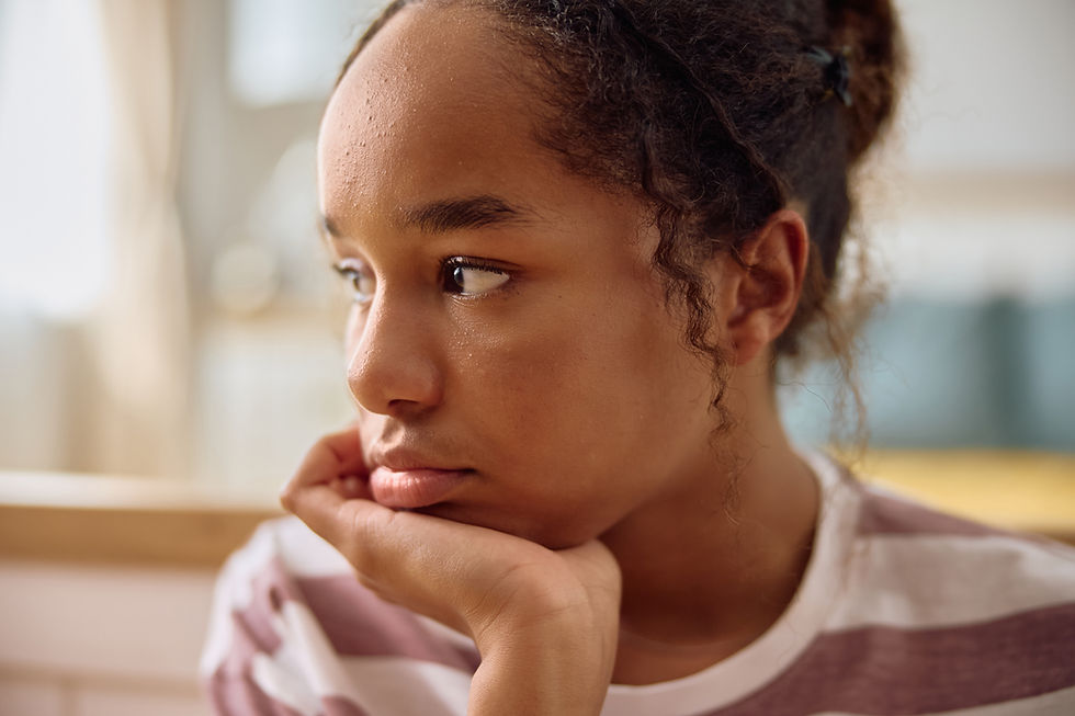 close-up-of-pensive-black-teenage-girl-at-home-2026-03-25-03-18-13-utc_edited.jpg
