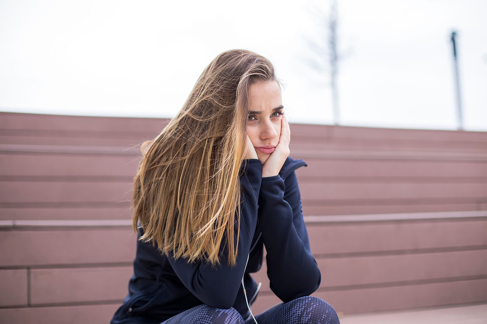 worried-sad-and-depressing-young-woman-sits-outsi-2026-03-19-06-37-59-utc.jpg