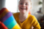 close-up-of-cheerful-little-girl-with-down-syndrom