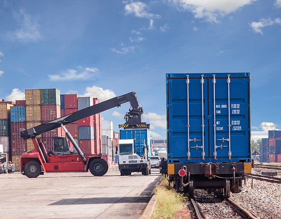 Hero Banner Image: "Global business team discussing international expansion strategy in a modern office."