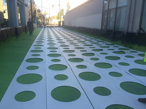 Asphalt decorative concrete stencil installation