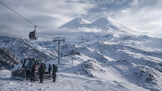 Travellers ascending the snow-covered slopes of Mount Elbrus