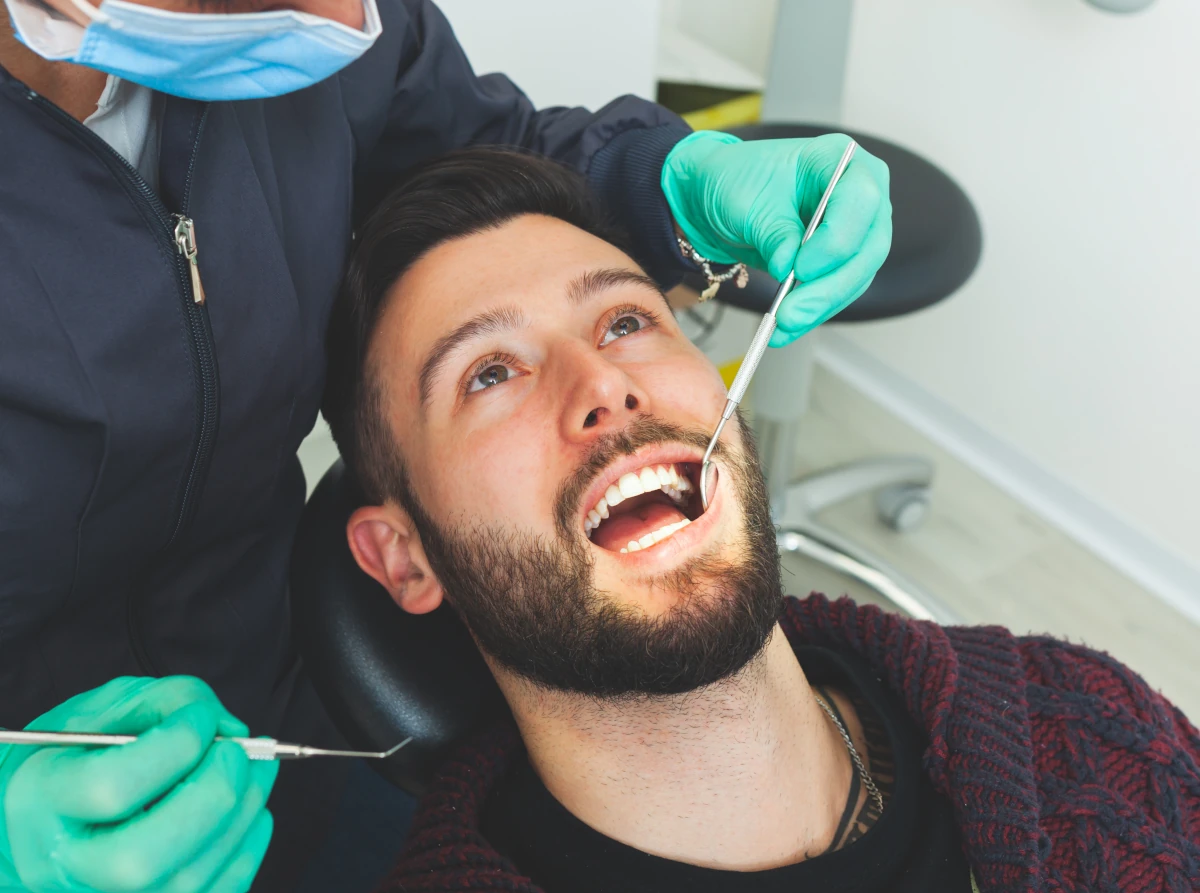 dentist-examines.webp