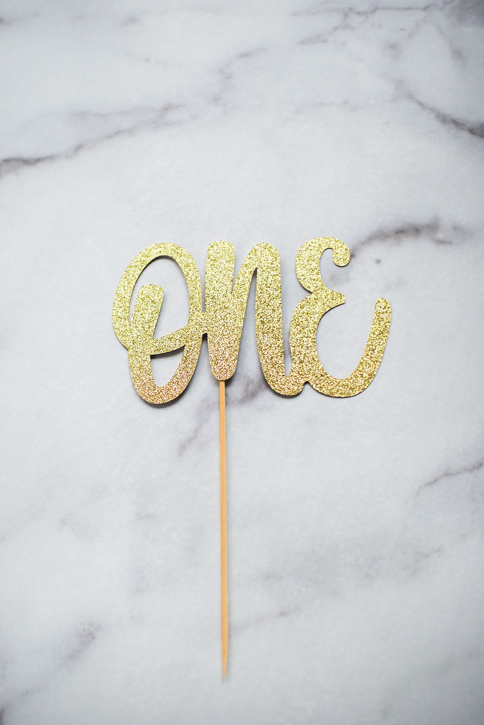 paper "one" gold cake topper