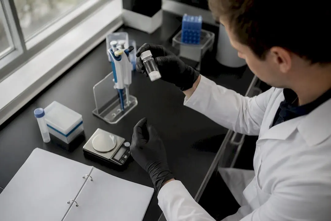 Eye-level view of a clean laboratory bench with peptide testing equipment