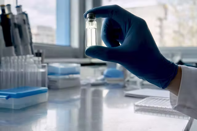Close-up of oxidizing peptide solution in vial