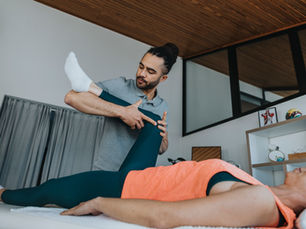 Physiotherapist using manual physiotherapy techniques