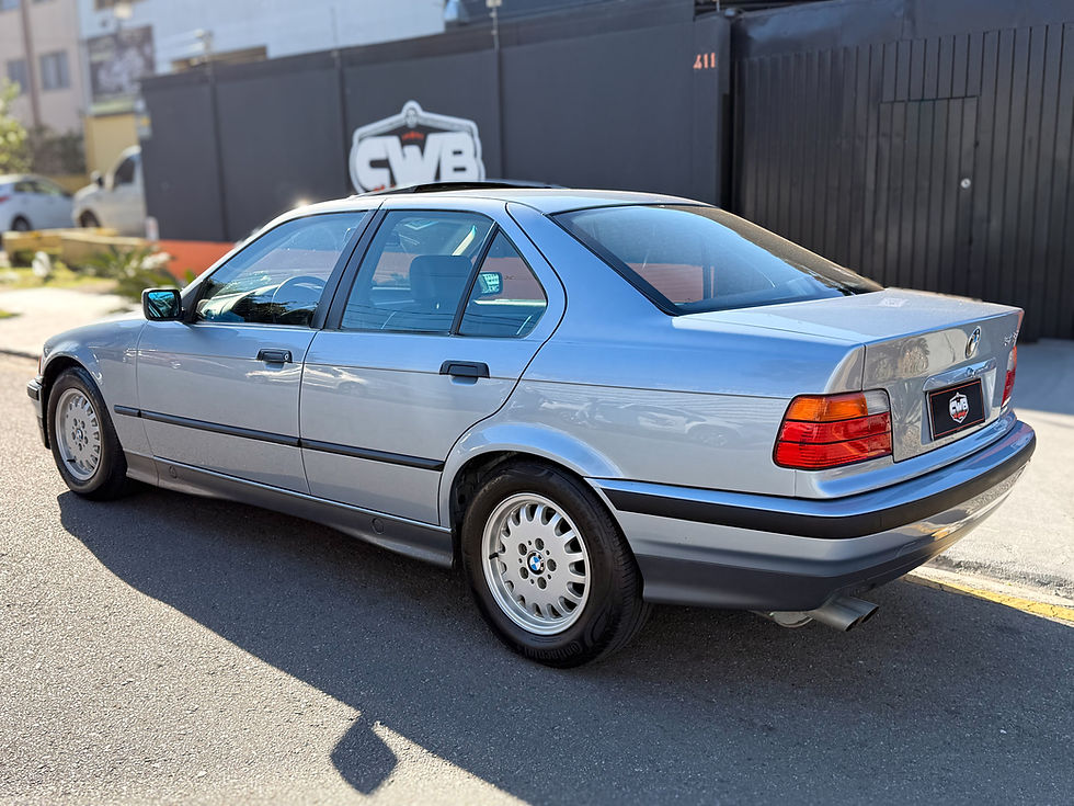 Miniatura: BMW 325i  Gletscher Blue 1991