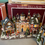 Thumbnail: PA - 112 - Illuminated Village Scenes - Bank & City Hall & Church & Sweet Shop