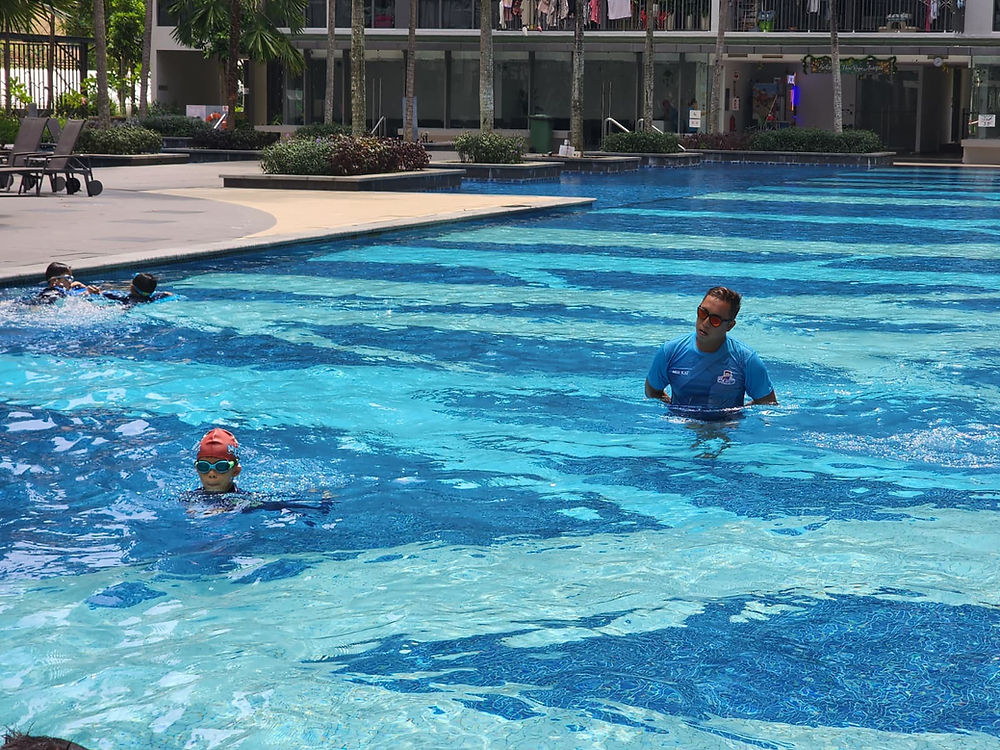 Kids learning breast stroke