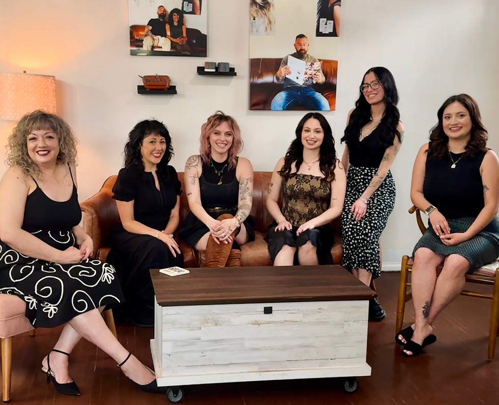 Nash Beauty Salon's team of expert and professional hairdressers, hair stylists, and color specialists sitting in the boutique interior of salon waiting area image.