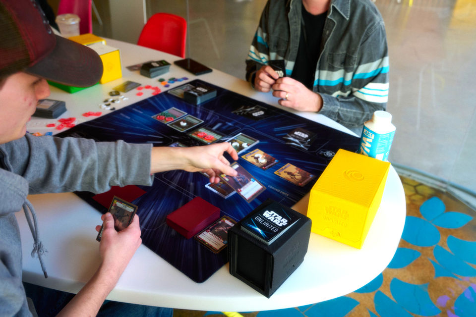 Two men playing Star Wars Unlimited