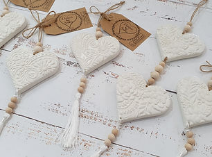 hearts wholesale embossed floral design with beaded tassel