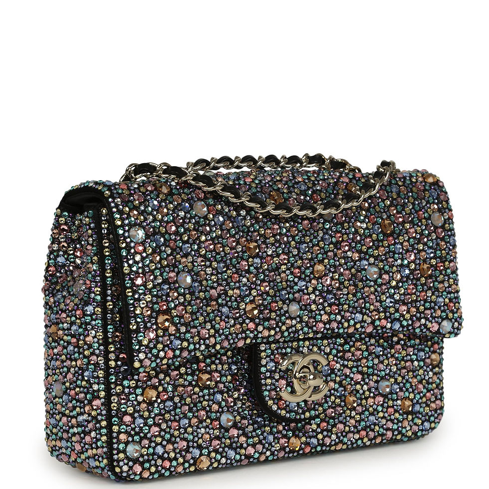 Side-angled view of the crystal-embellished Chanel Mini Flap showing the light gold turnlock