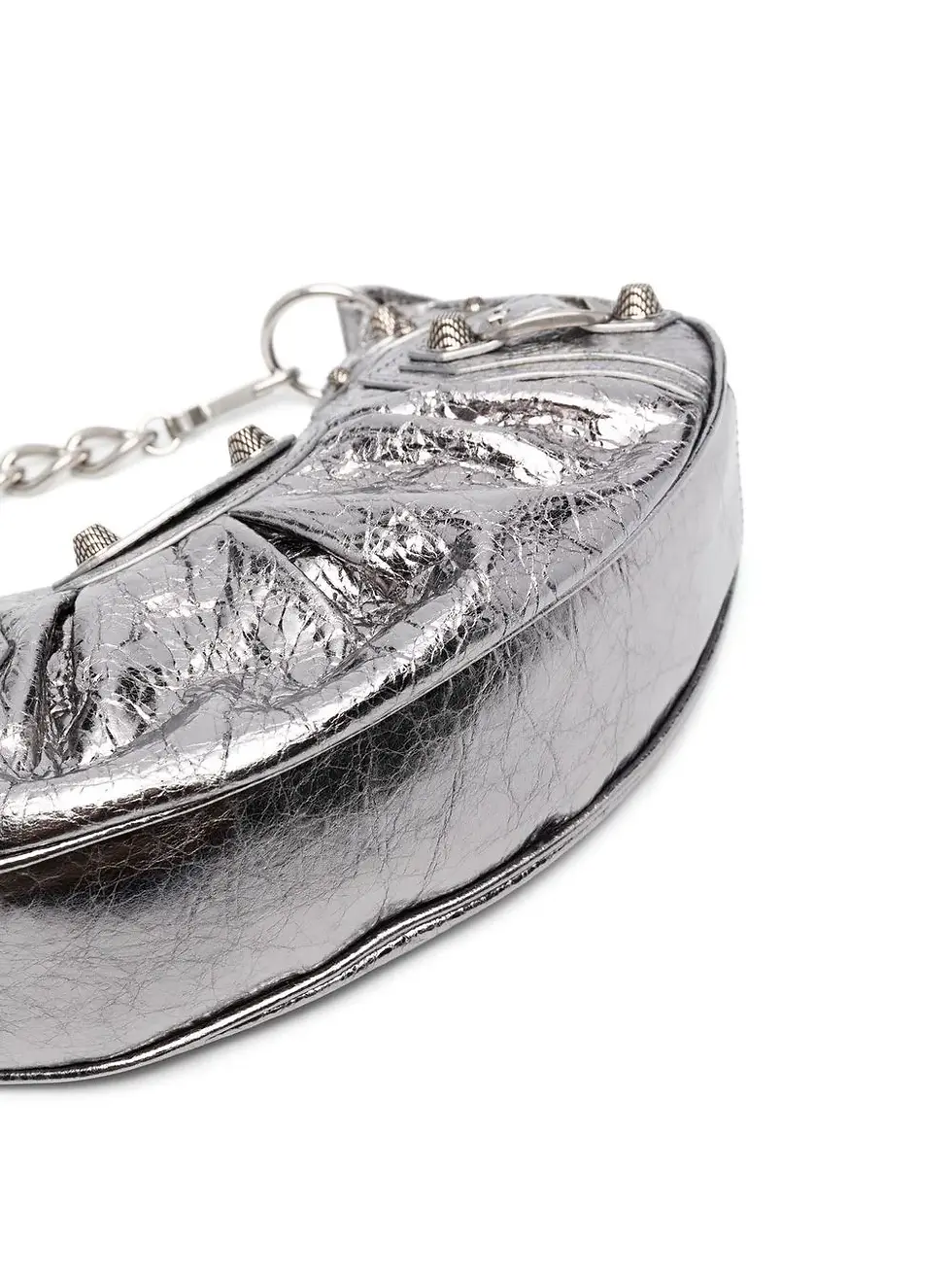 Thumbnail: Angled view of the silver Balenciaga Le Cagole XS bag with tassels