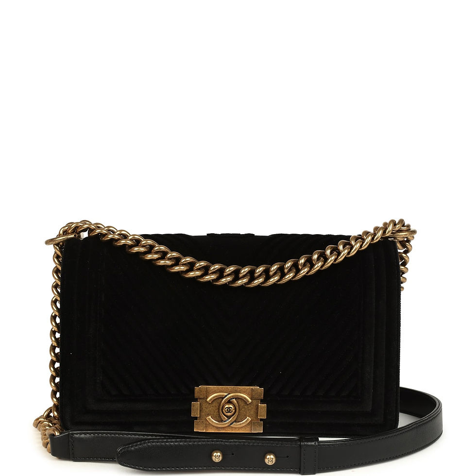 Chanel Medium Boy Bag in black chevron velvet with antique gold-tone chain strap