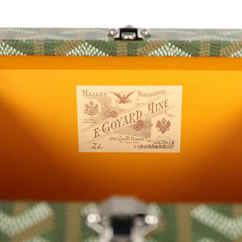 Thumbnail: Detail of the vintage Goyard Malles Maroquinerie label inside the trunk