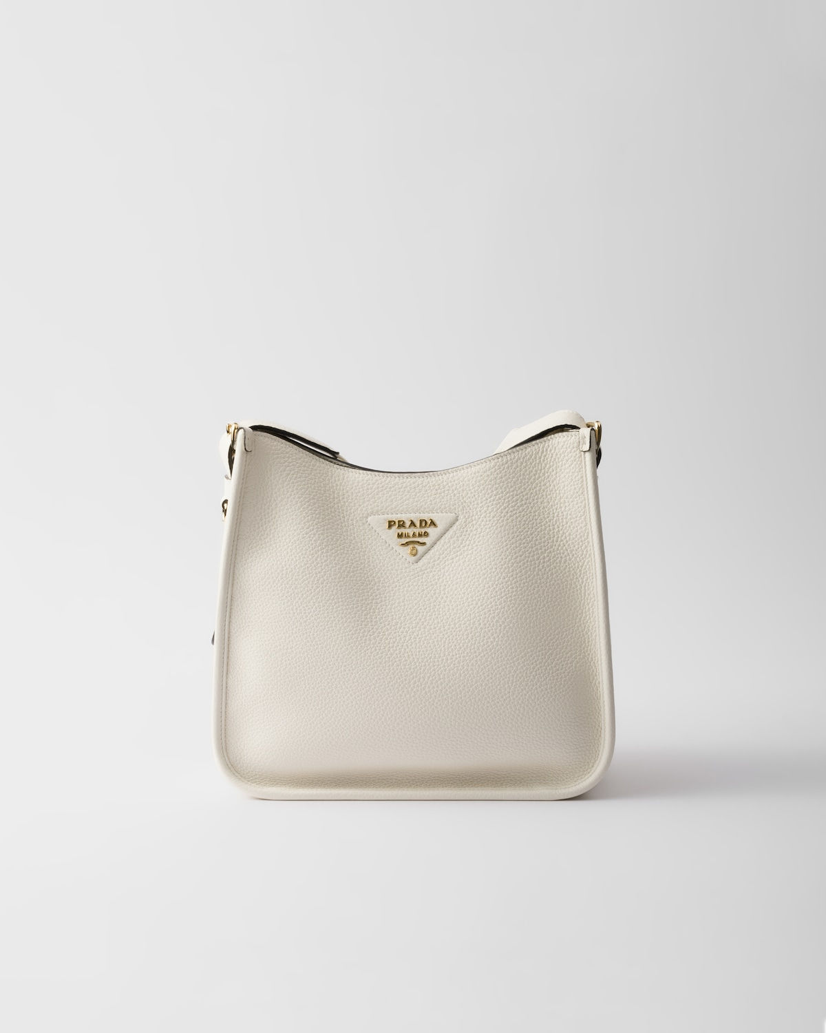 Prada medium flap shoulder bag in white leather – front view