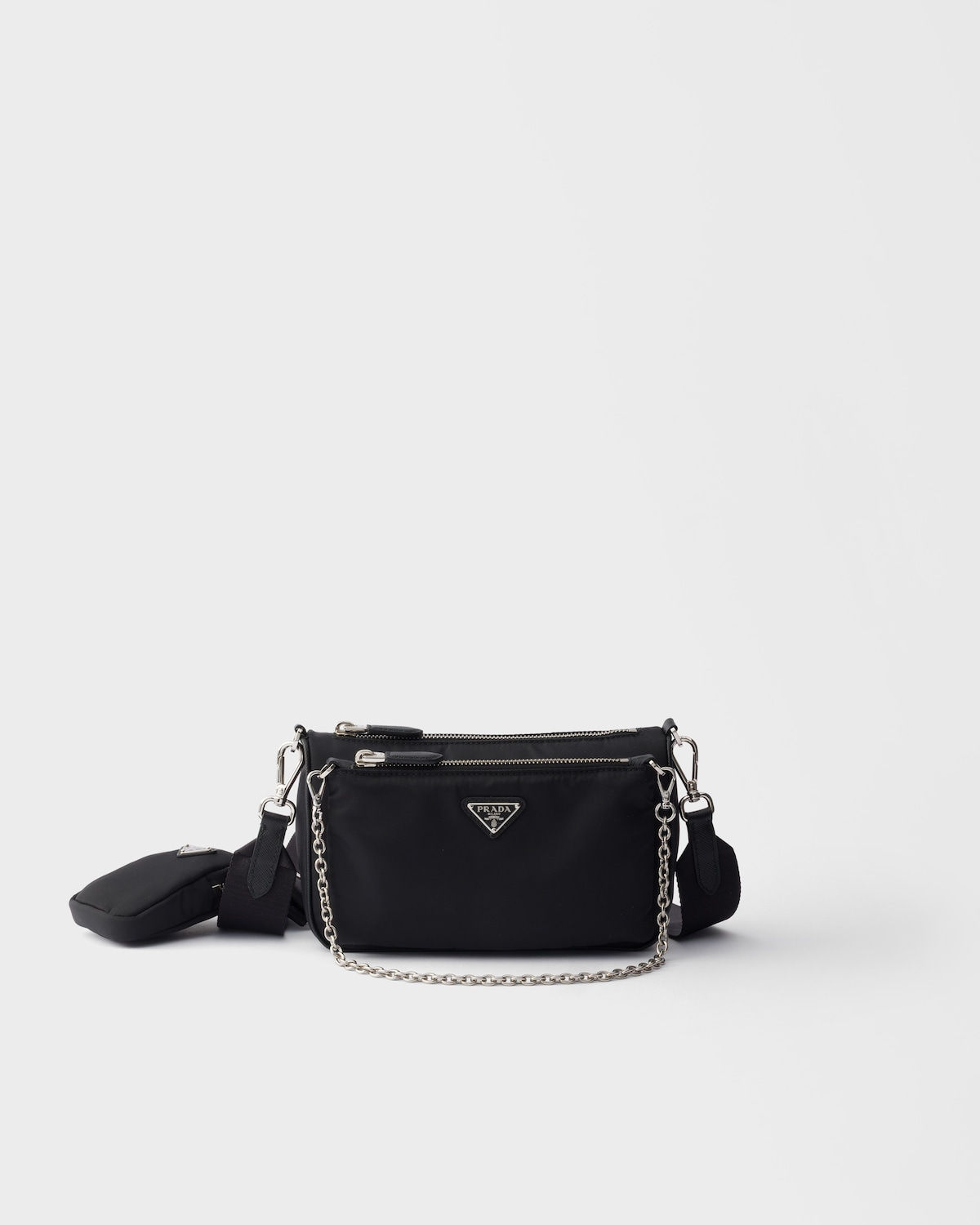 Prada mini shoulder bag with chain in black Re-Nylon and Saffiano leather – front view