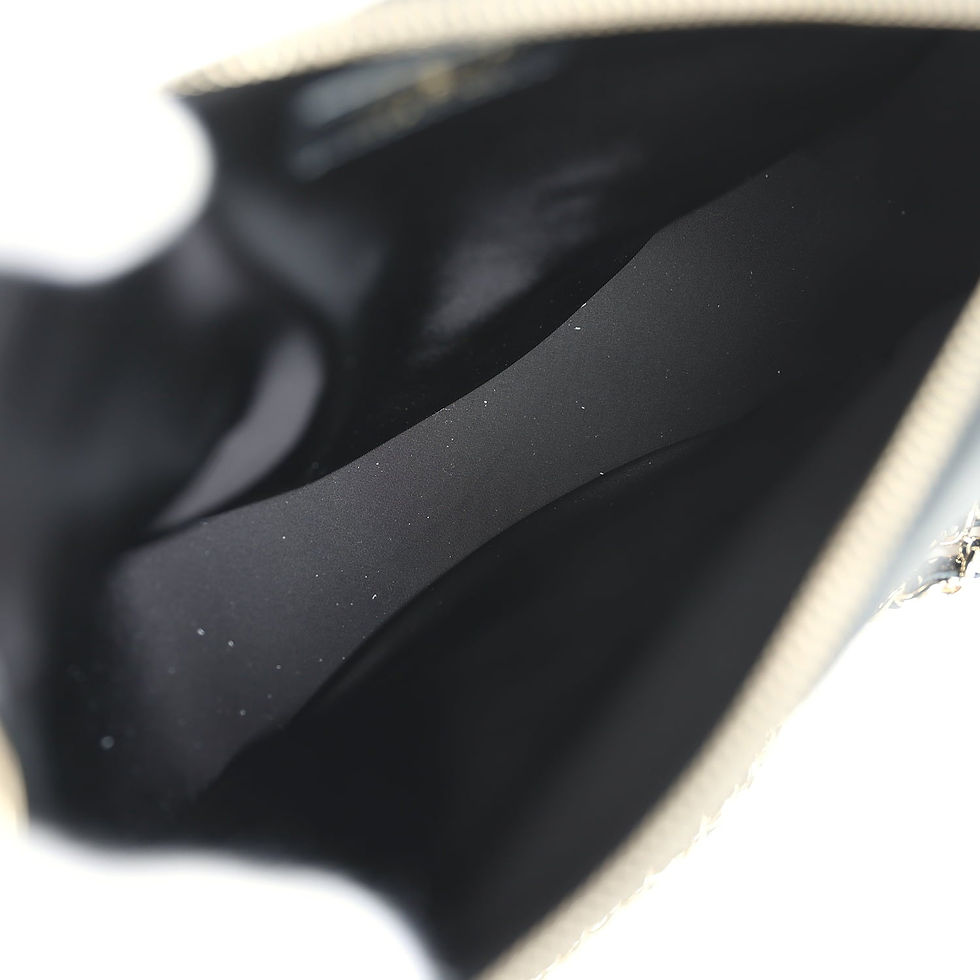 Thumbnail: Interior view of Chanel Coco Neige clutch showing black fabric lining