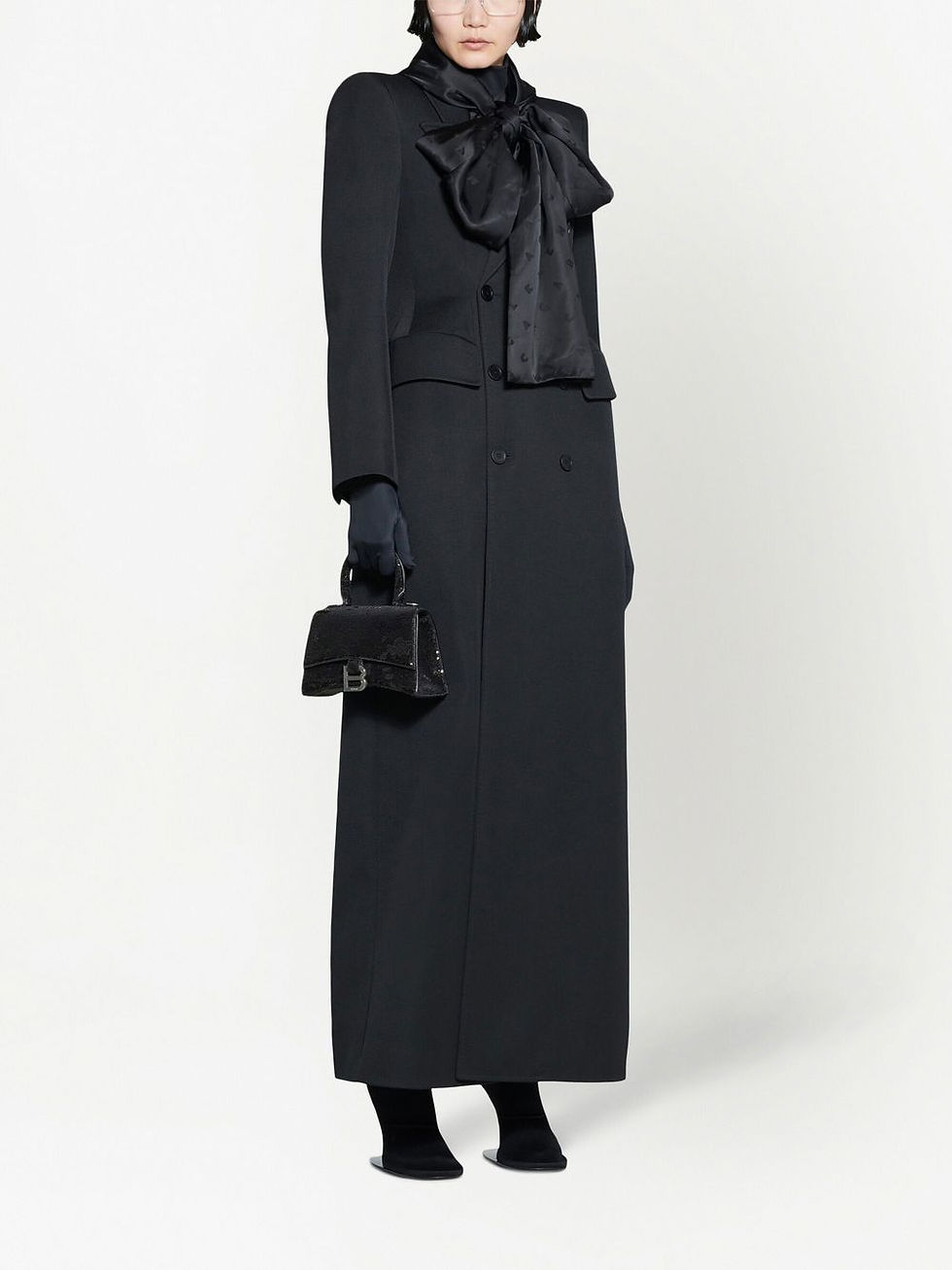 Thumbnail: Model wearing the Balenciaga Hourglass XS with a black dress