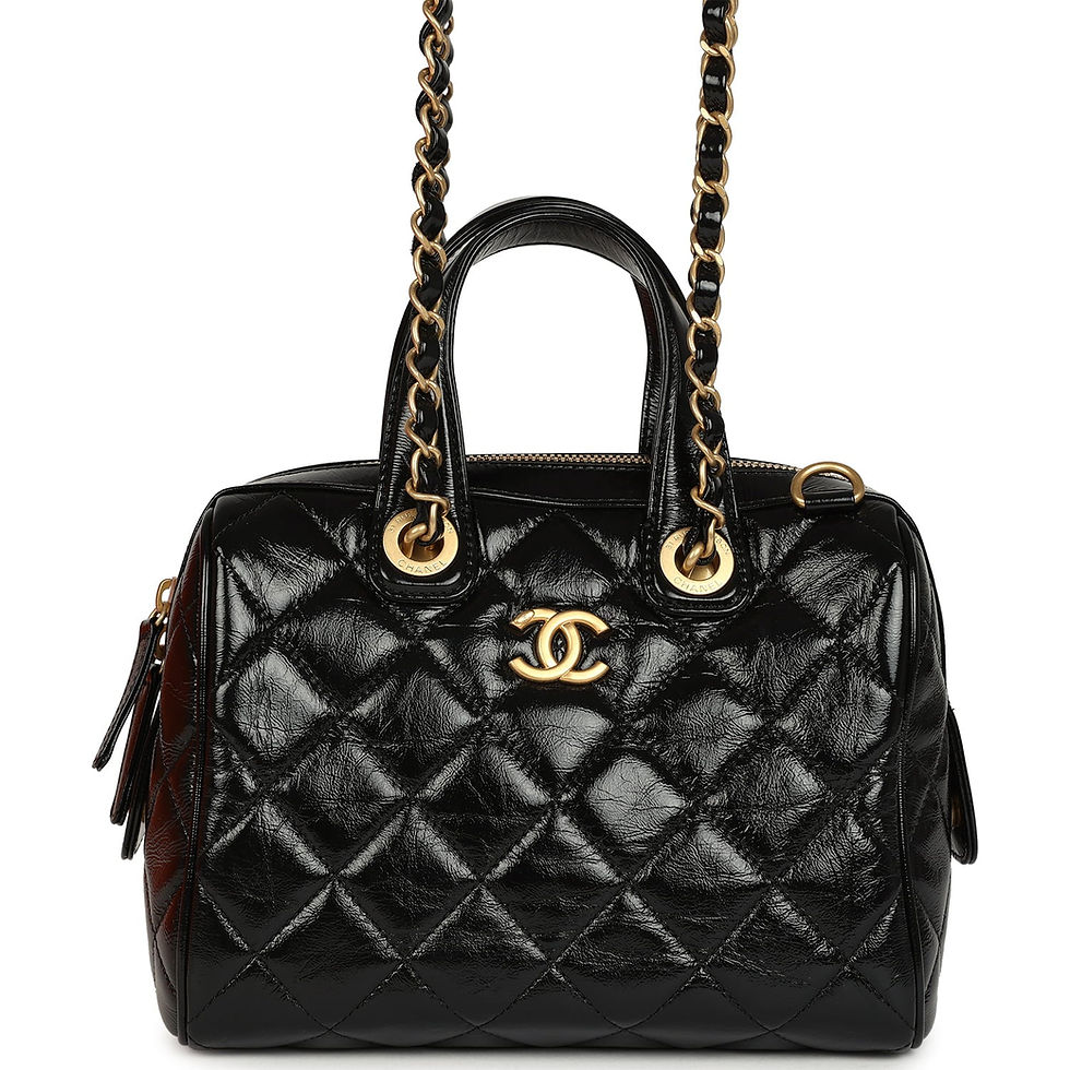 Front view of the Chanel CC Travel bowling bag in black crumpled calfskin with gold CC turnlock