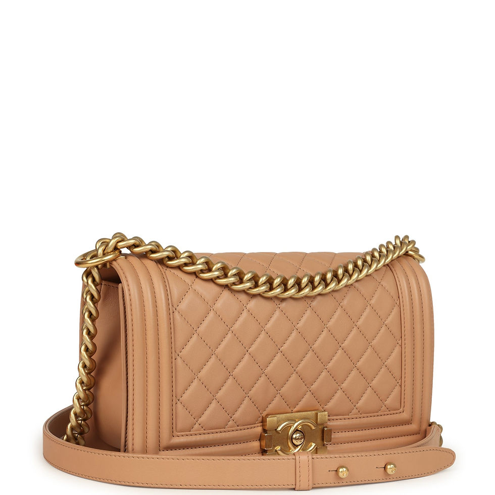 Three-quarter view of the dark beige Boy Bag showing the quilted flap and CC push-lock clasp