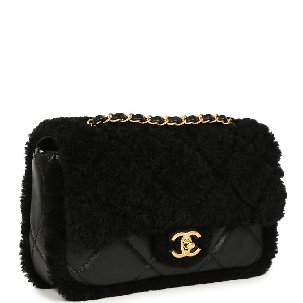 Three-quarter view of the shearling flap bag showing the CC turnlock and chain strap