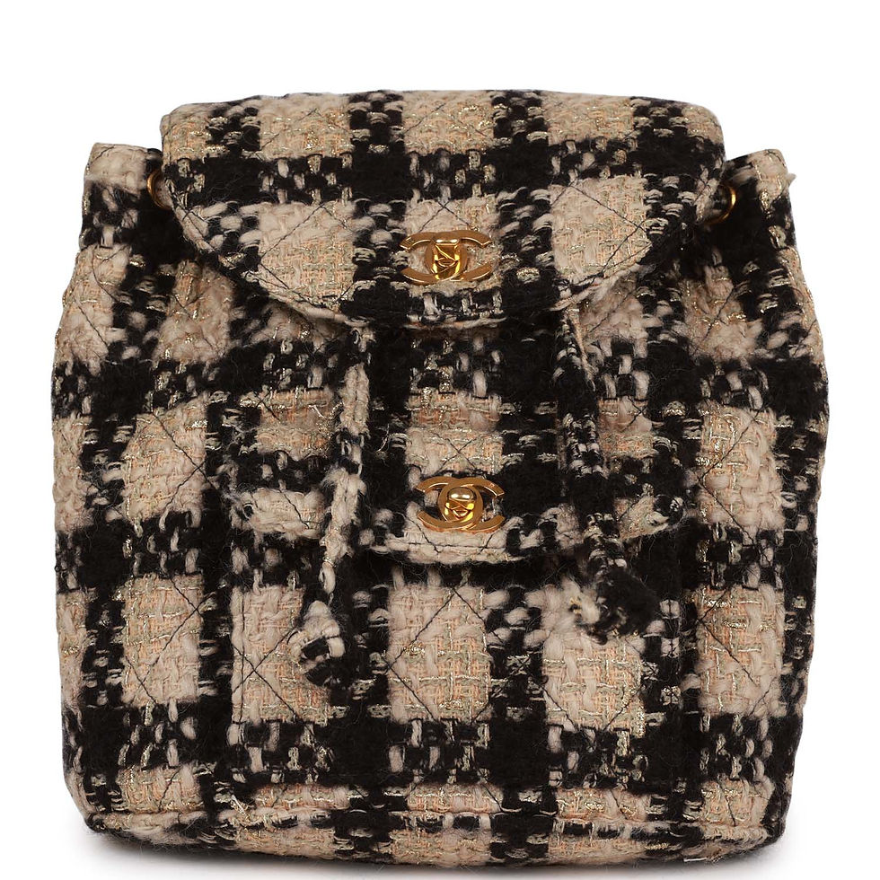 Front view of the vintage Chanel Duma Backpack in beige and black tweed with gold CC turnlocks