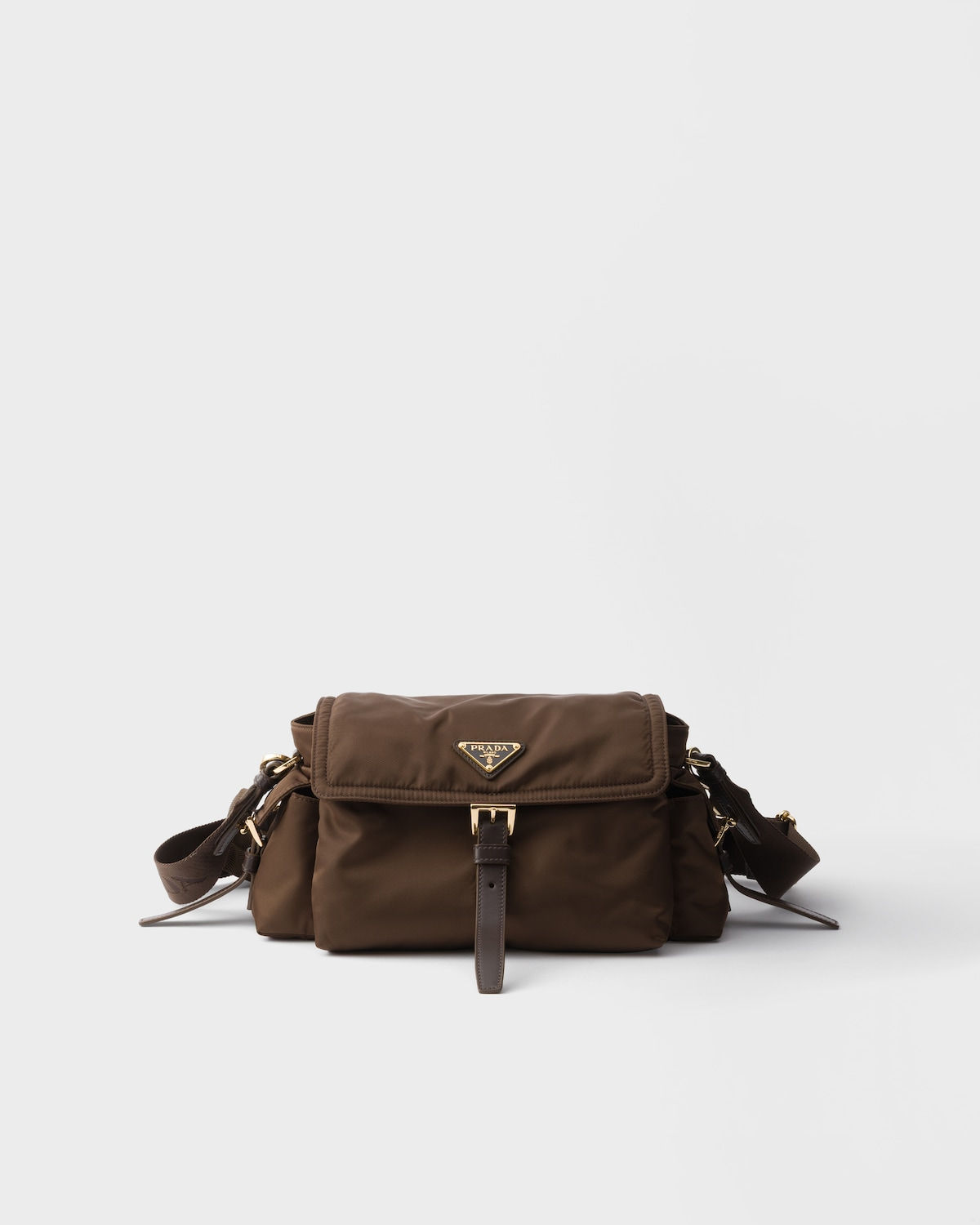 Prada Explore medium shoulder bag with flap in sienna Re-Nylon – front view