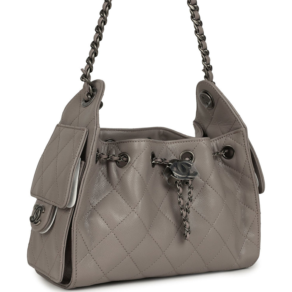 Angled view of the grey caviar hobo bag showing the front flap pocket and CC turnlock