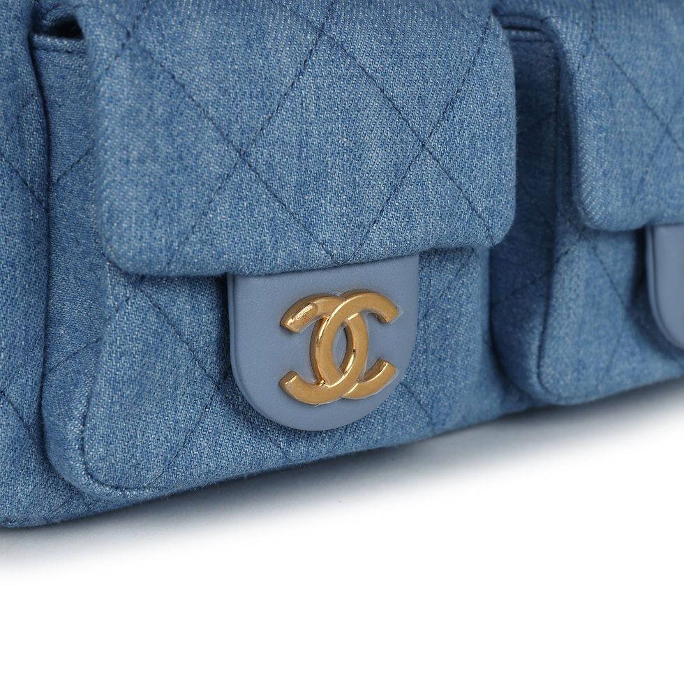 Thumbnail: Front view of the bag worn with the chain-link strap extended
