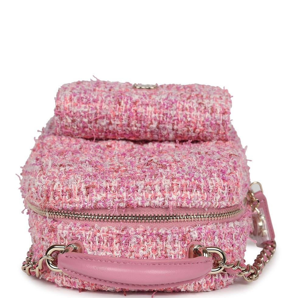 Thumbnail: Back view of the pink tweed backpack showing the dedicated phone slot pocket