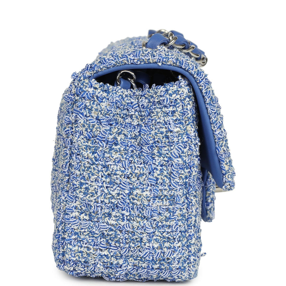 Thumbnail: Side view of the blue and white tweed flap bag with its structured silhouette