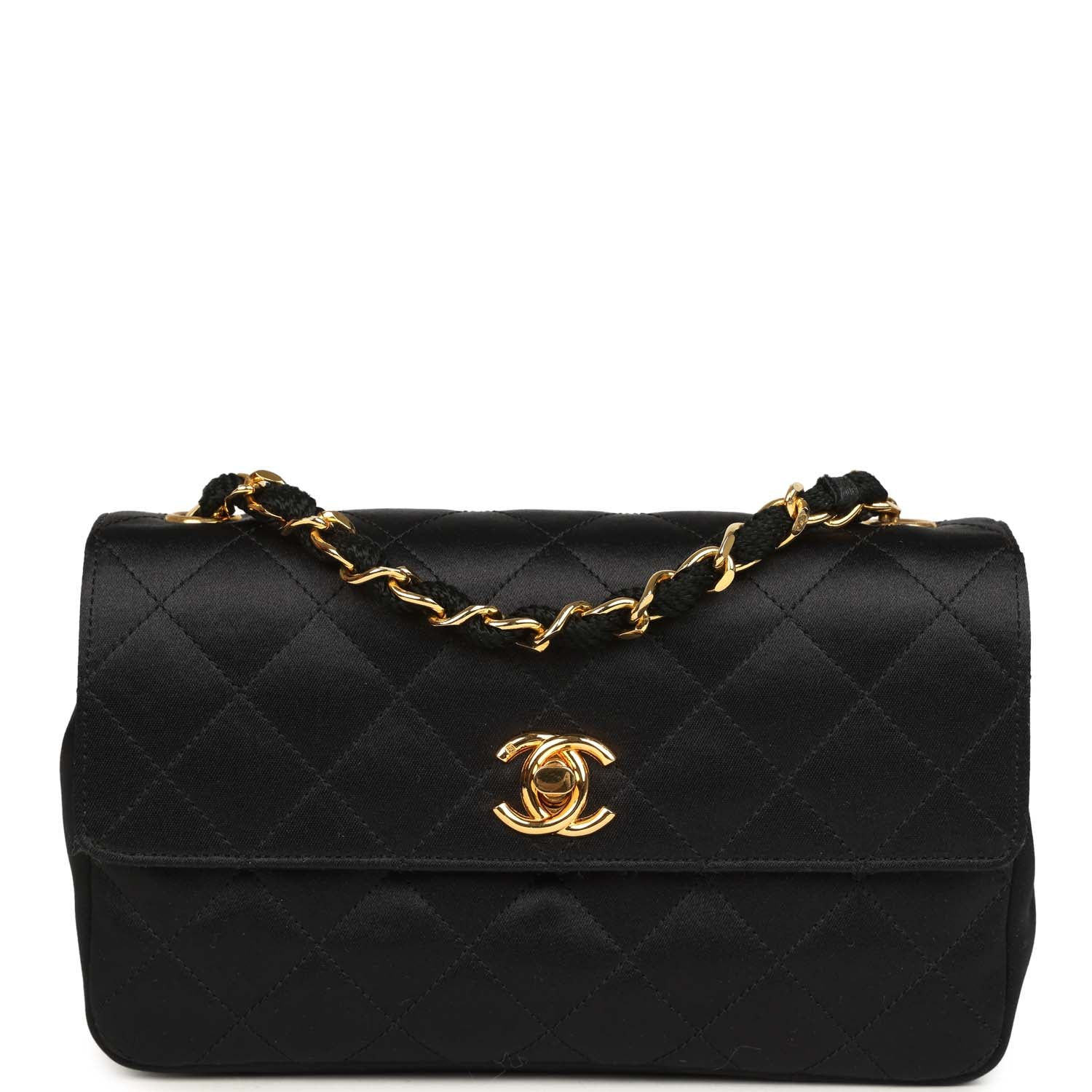 Front view of the vintage Chanel Mini Rectangular Flap Bag in black satin with a gold CC turnlock