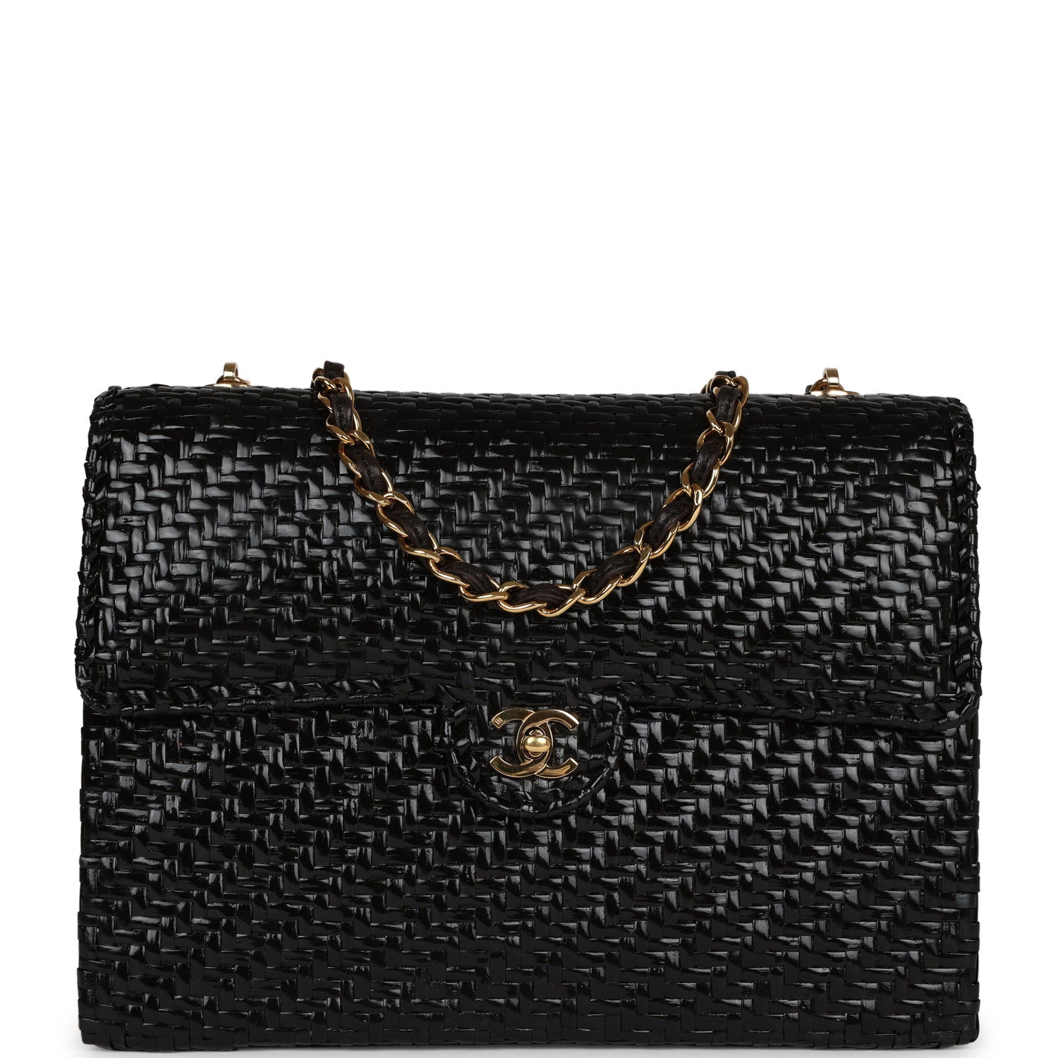 Vintage Chanel Flap Bag in black woven wicker, shown front-facing with gold-tone CC turnlock