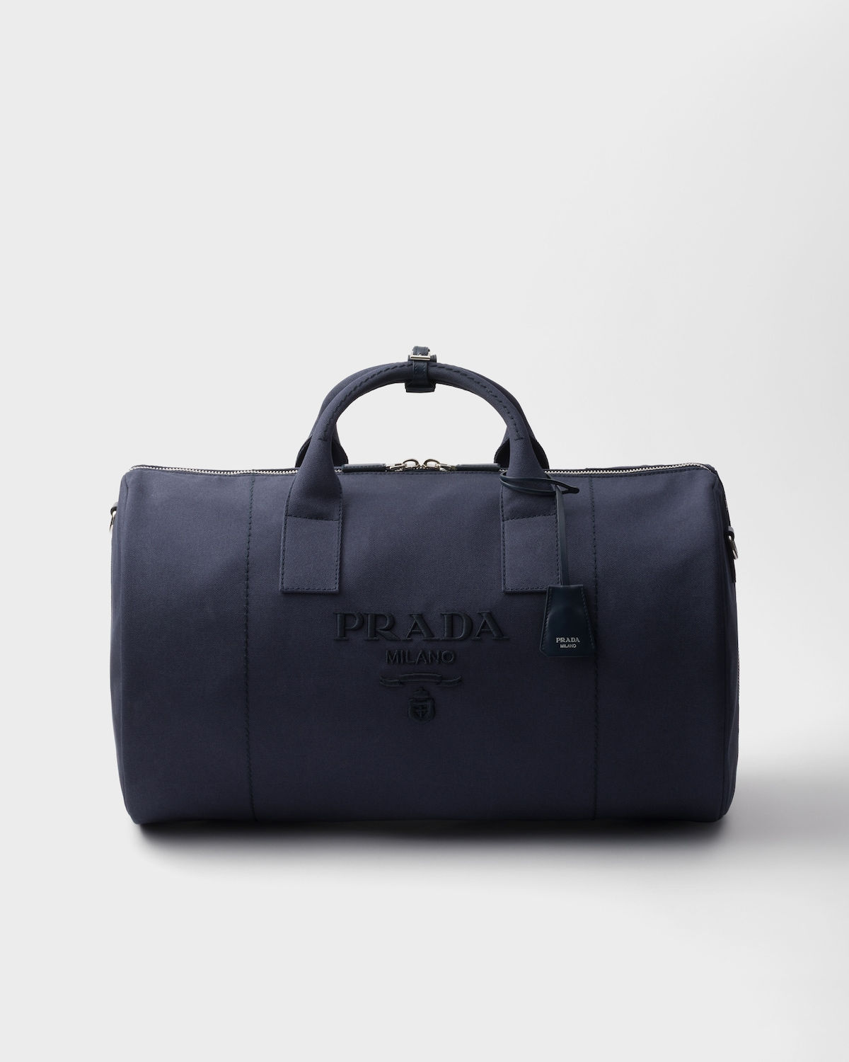 Prada duffle bag in Baltic blue canvas and leather – front view