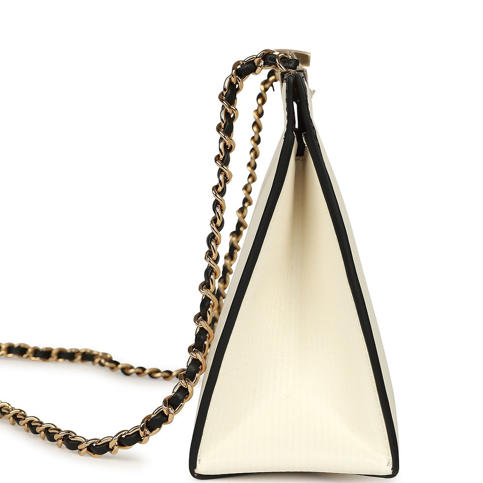 Thumbnail: Side profile of the Chanel Shop By Night Clutch showing its triangular gusset and black trim
