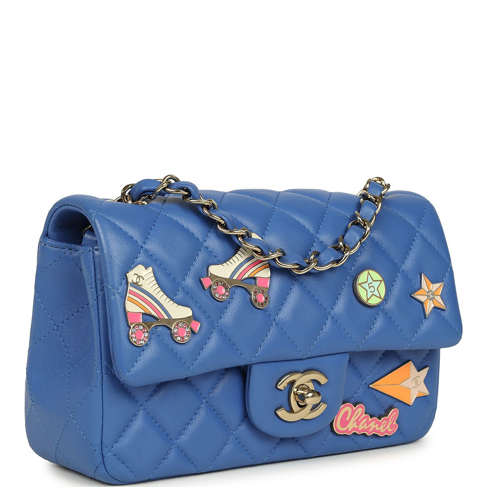 Three-quarter angled view showing the star and shooting-star charms across the quilted flap