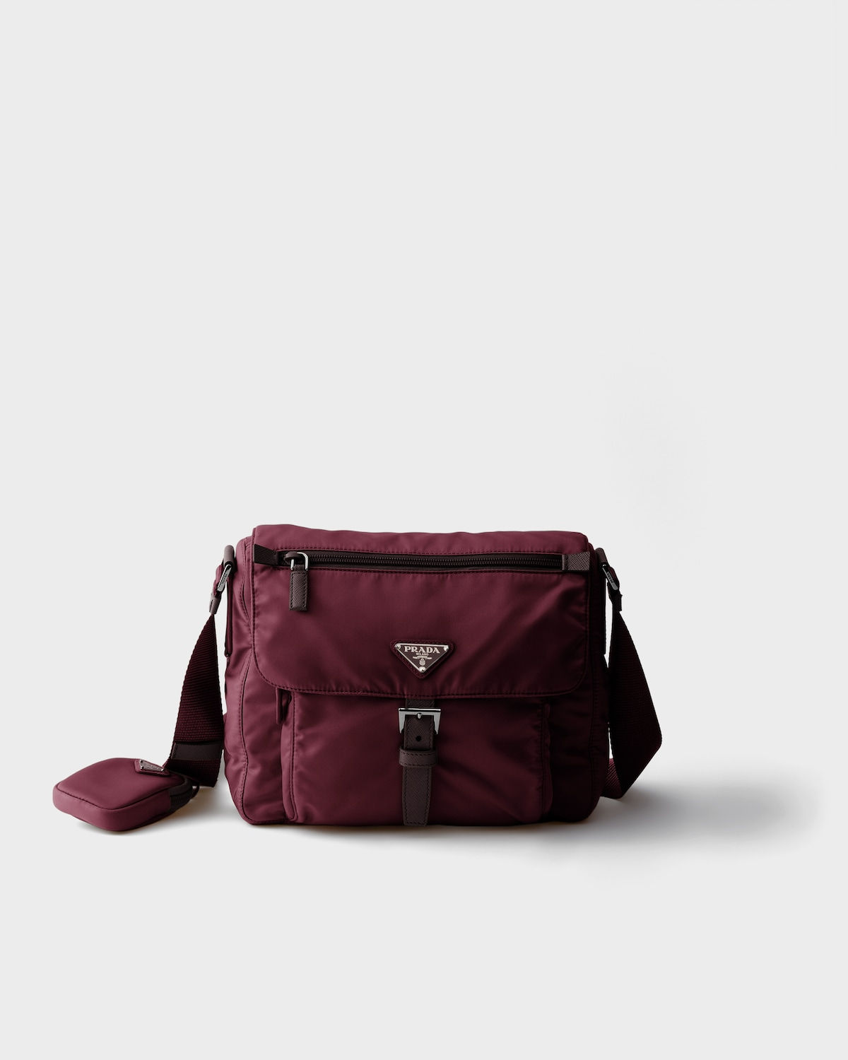 Prada shoulder bag with buckle pocket in burgundy Re-Nylon – front view