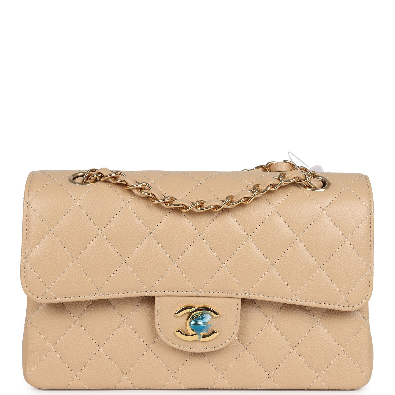 Chanel Small Classic Double Flap bag in beige caviar leather, front view with protective plastic on CC turnlock