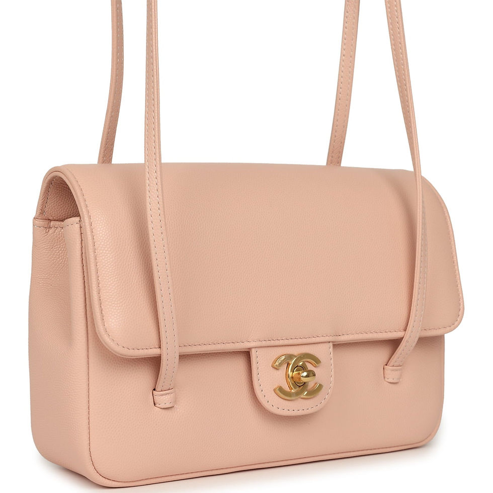 Three-quarter angle showing the pebbled caviar grain in a soft blush pink tone
