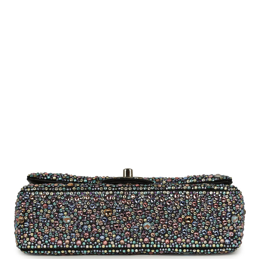 Thumbnail: Base view of the crystal-embellished Chanel Mini Flap showing the CC turnlock closure from below